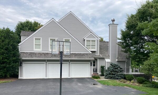 Replaced stucco siding with Hardie 8-1/4'' Cedarmill Fibercement, Pearl Gray Siding; Newtown Square, PA, Chester County, PA; Installed August 2022