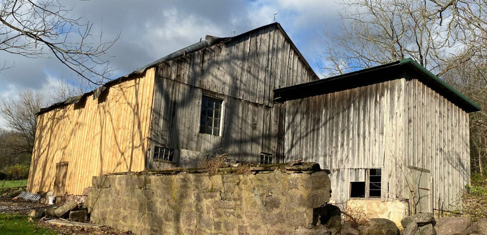 old barn in need of roof repair